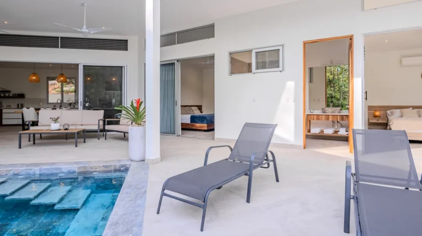 A Unique Rainforest Estate with Two Luxury Homes, River, and Waterfall on 4.93 Acres in Uvita