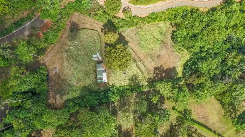 A Unique Rainforest Estate with Two Luxury Homes, River, and Waterfall on 4.93 Acres in Uvita