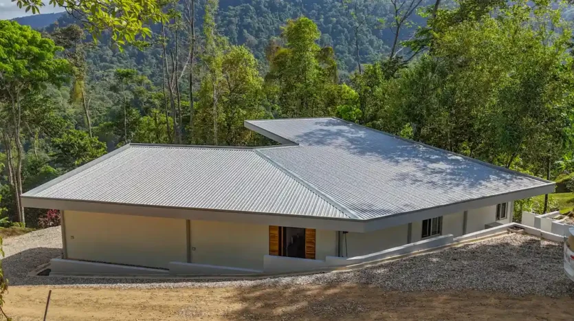 A Unique Rainforest Estate with Two Luxury Homes, River, and Waterfall on 4.93 Acres in Uvita