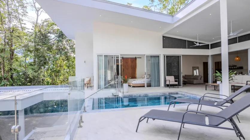 A Unique Rainforest Estate with Two Luxury Homes, River, and Waterfall on 4.93 Acres in Uvita