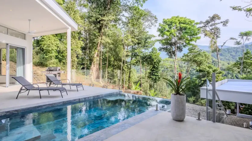A Unique Rainforest Estate with Two Luxury Homes, River, and Waterfall on 4.93 Acres in Uvita